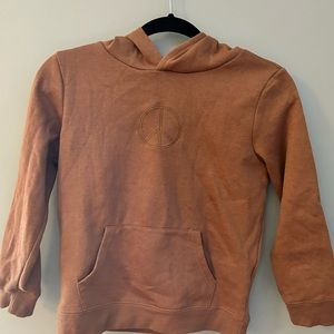 Brown sweatshirt and cheetah print sweatpants